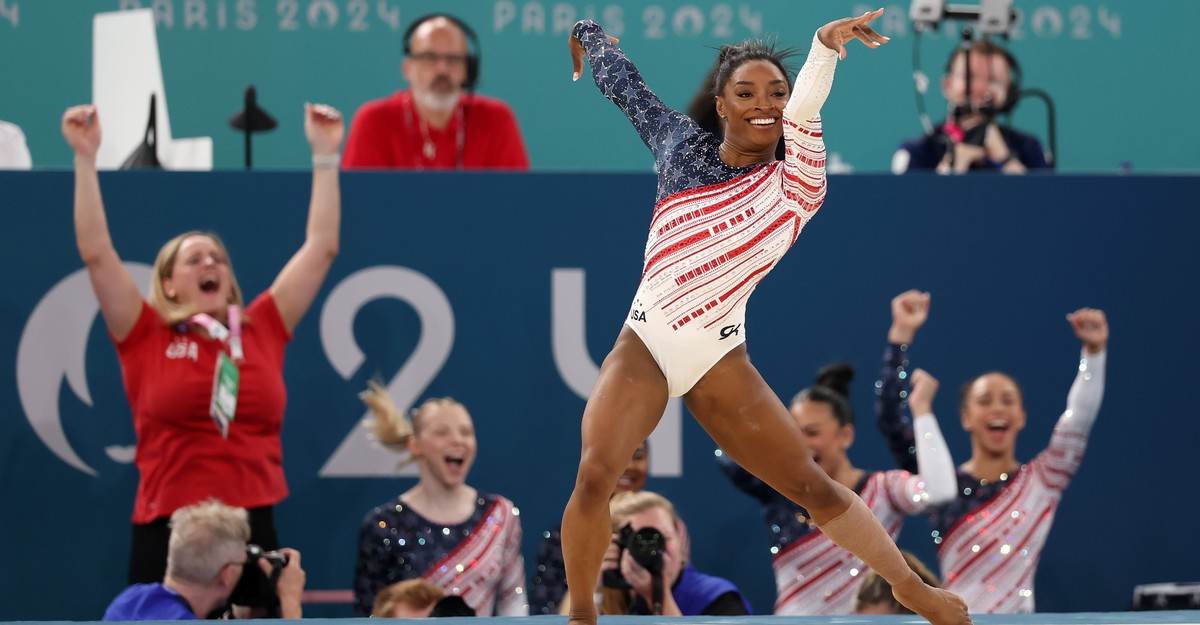 Olympics Photo of the Day: Celebrating a Winning Team Effort