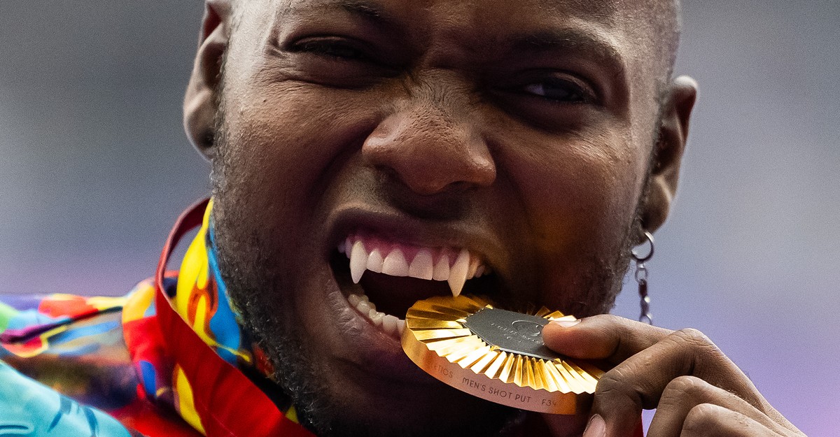 Paralympics Photo of the Day: A Vampire Who Bites Medals